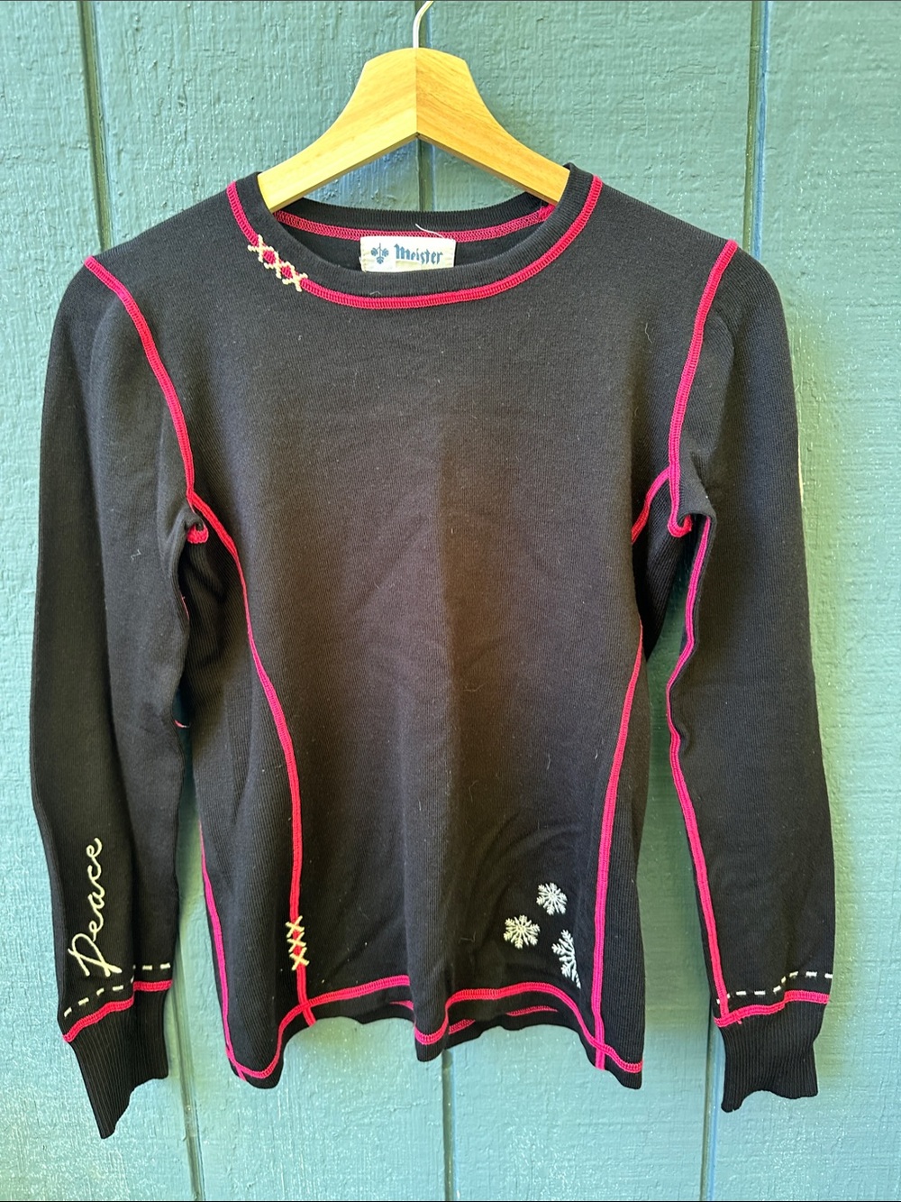 Meister Black Crewneck Sweater with Pink Contrast Stitching and Floral Accents